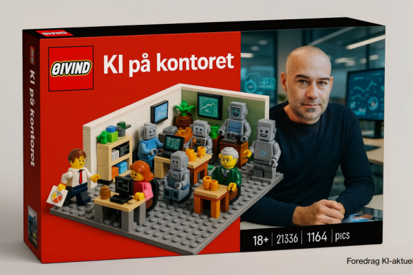 legoboks med skallet mann med lett skjegg og bart på haka sitter til høyre i bildet og ser i kameraet, til venstre er det legofigurer som mennesker og roboter som sitter ved kontorpulter